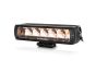 Angled view of the lamp face highlighting the depth of the housing and the contours of the lens and outer casing.