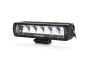Angled view of the lamp face highlighting the depth of the housing and the contours of the lens and outer casing.