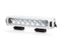 Angled view of the lamp face highlighting the depth of the housing and the contours of the lens and outer casing.