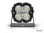 Front view of the lamp face showing the lens and central light source, with the housing and bezel clearly visible